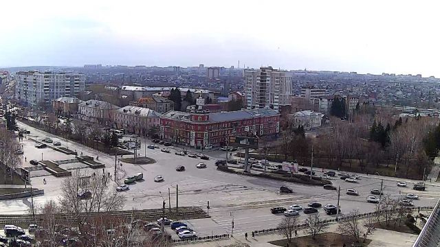 Clock under the spire on October Square in Barnaul city, Russia