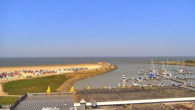Beach and jetty in the resort town of Bensersiel, Germany