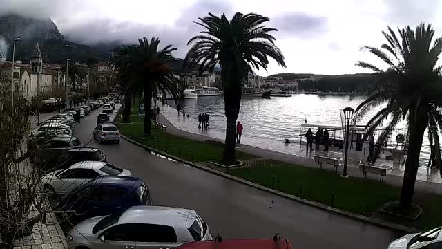 Seaside promenade with a pier in Makarska town, Croatia